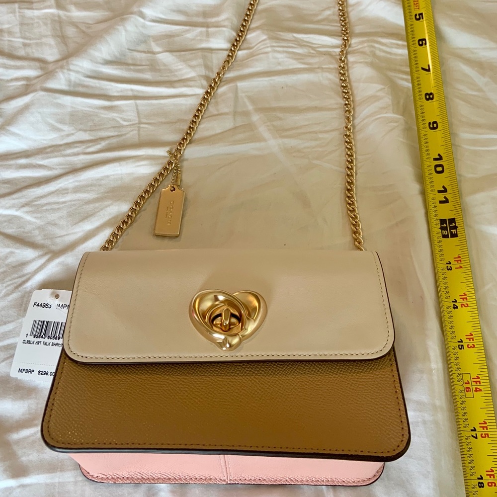 Coach tri-color heart lock purse.